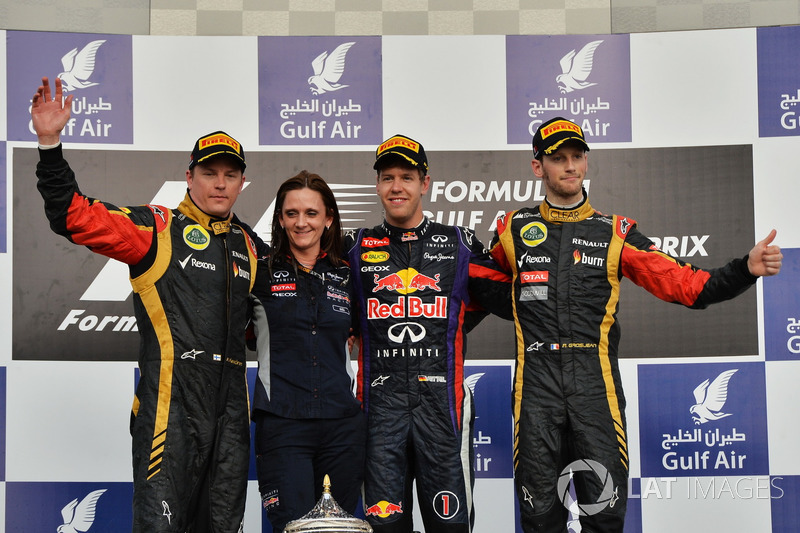 Podium: tweede Kimi Raikkonen, Lotus F1 Team, Gill Jones, Red Bull Racing, winnaar Sebastian Vettel,