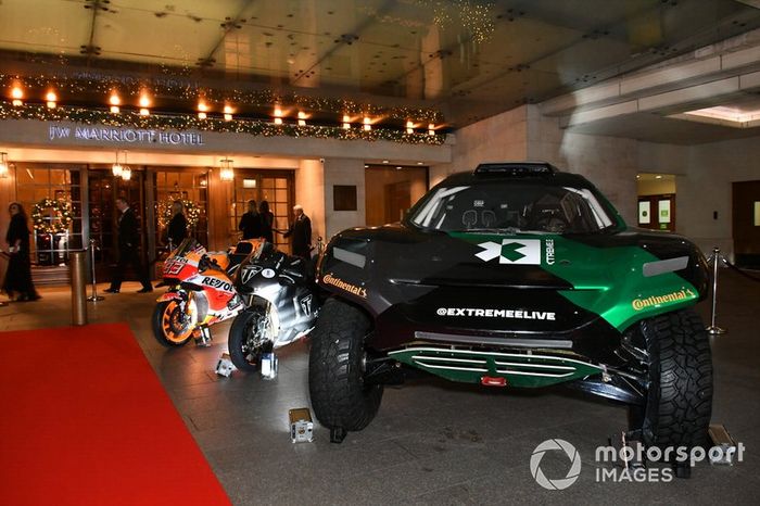 Moto GP and Rally Raid cars on display outside the venue