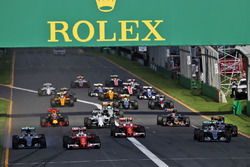 Sebastian Vettel, Ferrari SF16-H leads at the start of the race