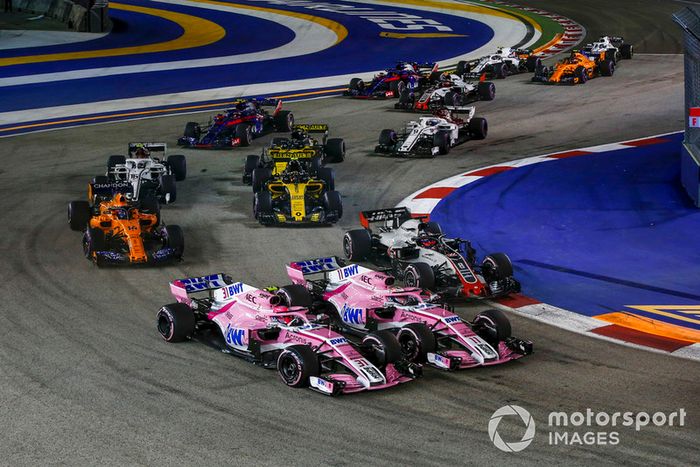 12: Esteban Ocon y Sergio Pérez (Force India)