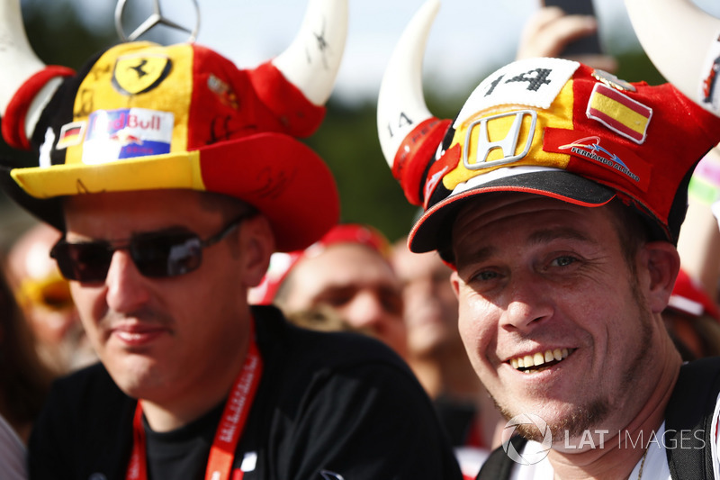 A Fernando Alonso, McLaren, supporter wears a novelty