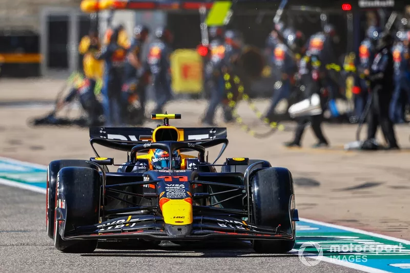 Sergio Perez, Red Bull Racing RB20 after making a pit stop