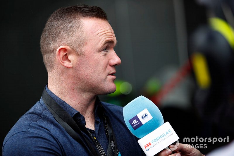 Footballer Wayne Rooney speaks to the media