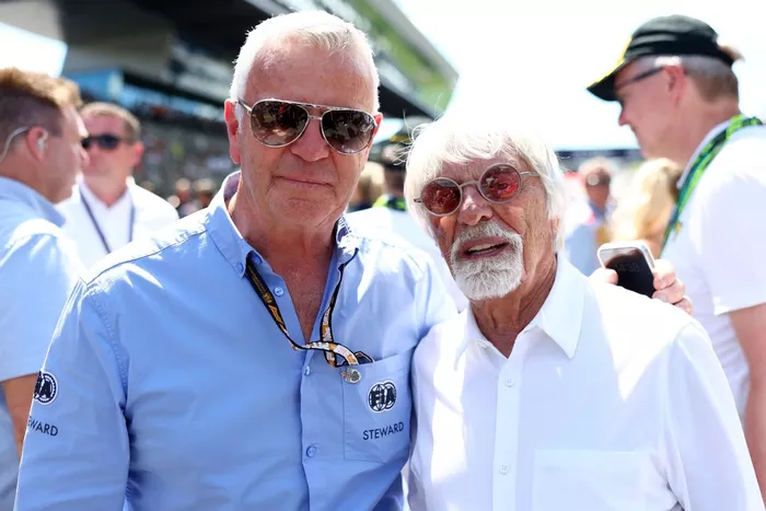 Derek Warwick, FIA Steward on the grid with Bernie Ecclestone