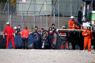 The crashed car of Pierre Gasly, Red Bull Racing RB15 is recovered