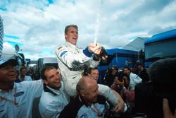 Race winner Johnny Herbert, Stewart Grand Prix celebrates with his crew