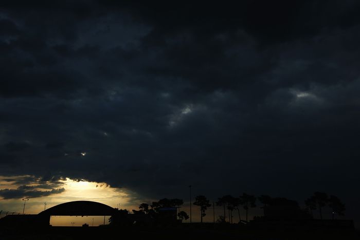 Car drives under the Dunlop Bridge at sunrise