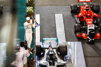 Lewis Hamilton, Mercedes AMG F1, 1st position, with his trophy on the podium