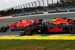 Kimi Raikkonen, Ferrari SF71H en Max Verstappen, Red Bull Racing RB14 