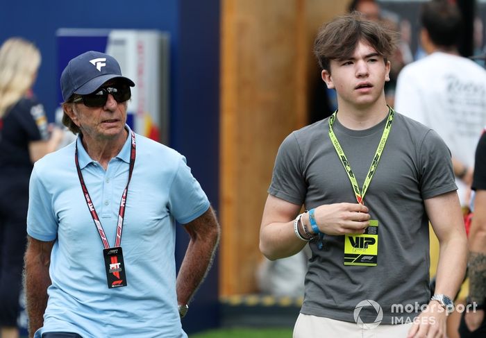  Emerson Fittipaldi and Emerson Fittipaldi Jr walk in the Paddock 