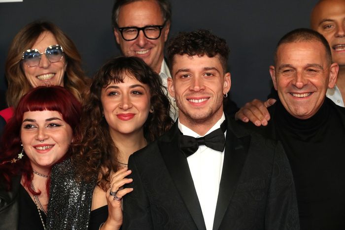 Marco Bezzecchi, moto Aprilia Racing y Chiara Marchetti