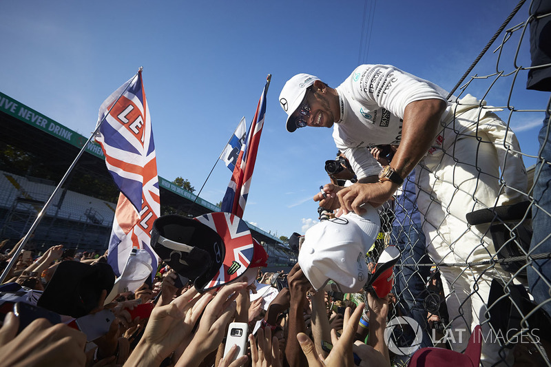 Lewis Hamilton, Mercedes AMG F1, signs autographs for fans
