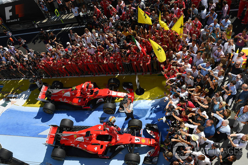 Race winner Sebastian Vettel, Ferrari and Kimi Raikkonen, Ferrari celebrate in parc ferme