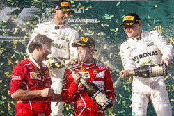 Podum: 1. Sebastian Vettel, Ferrari; 2. Lewis Hamilton, Mercedes AMG F1; 3. Valtteri Bottas, Mercede