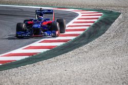 Marc Marquez drives a Toro Rosso F1