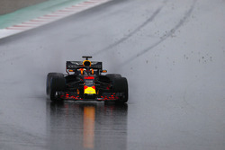 Daniel Ricciardo, Red Bull Racing RB14, spreads gravel onto the track after running wide