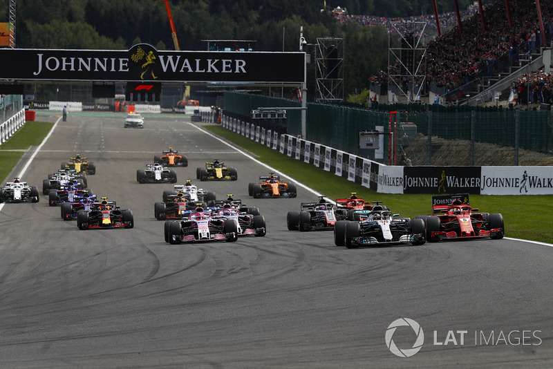 Lewis Hamilton, Mercedes AMG F1 W09, leads Sebastian Vettel, Ferrari SF71H, Esteban Ocon, Racing Point Force India VJM1, Sergio Perez, Racing Point Force India VJM11, Romain Grosjean, Haas F1 Team VF-18, and Kimi Raikkonen, Ferrari SF71H, at the start