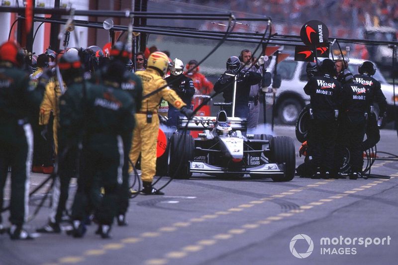 Mika Hakkinen, McLaren MP4/15, exits the pits