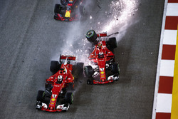 Kimi Raikkonen, Ferrari SF70H hits Sebastian Vettel, Ferrari SF70H and Max Verstappen, Red Bull Racing RB13