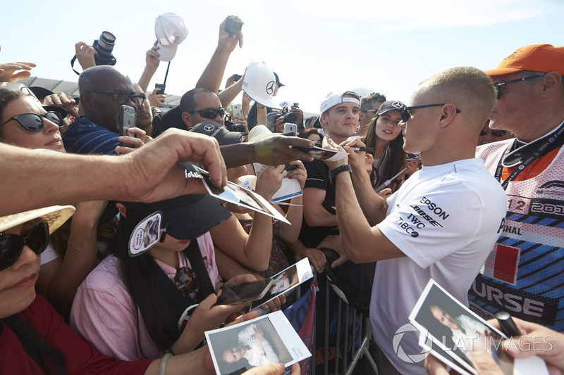 Valtteri Bottas, Mercedes AMG F1, signs autographs for fans