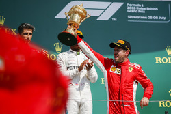 Race winner Sebastian Vettel, Ferrari, celebrates on the podium
