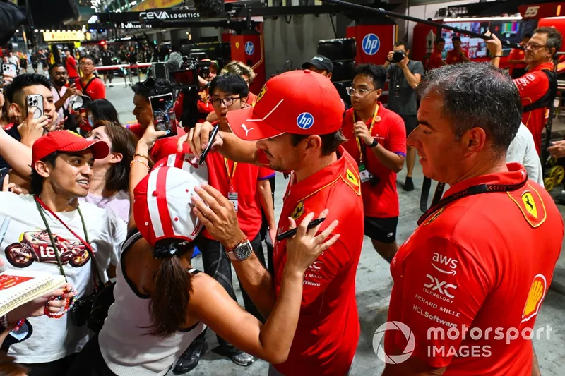 Charles Leclerc, Scuderia Ferrari, signs autographs for fans