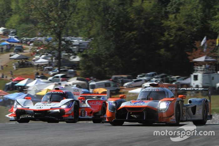 #6 Acura Team Penske Acura DPi: Juan Pablo Montoya, Dane Cameron, Simon Pagenaud  #54 Core autosport Nissan DPi: Jonathan Bennett, Colin Braun, Romain Dumas