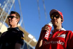 Sebastian Vettel, Ferrari and Daniil Kvyat, Red Bull Racing