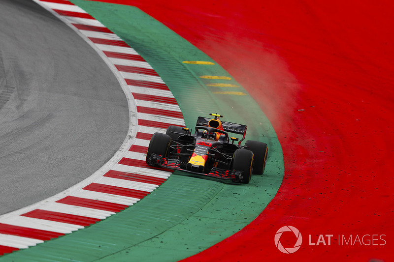 Max Verstappen, Red Bull Racing RB14, runs wide over a kerb