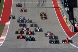 Lewis Hamilton, Mercedes AMG F1 W08, battles with Sebastian Vettel, Ferrari SF70H, ahead of the rest of the field