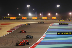 Sebastian Vettel, Ferrari SF71H, leads Valtteri Bottas, Mercedes AMG F1 W09, Kimi Raikkonen, Ferrari