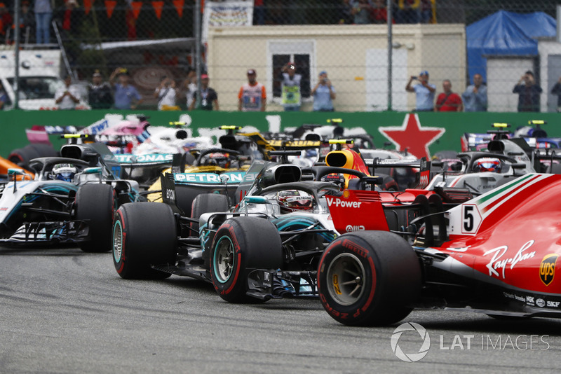 Sebastian Vettel, Ferrari SF71H, leads Lewis Hamilton, Mercedes AMG F1 W09