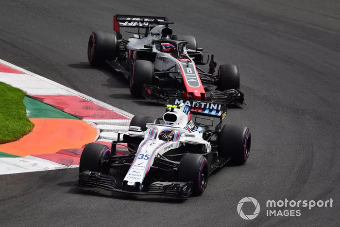 Sergey Sirotkin, Williams FW41 y Romain Grosjean, Haas F1 Team VF-18 