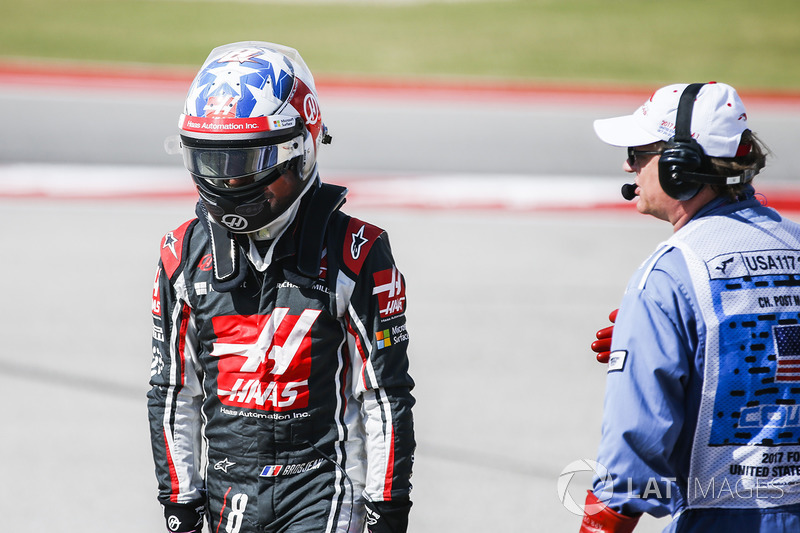 Romain Grosjean, Haas F1 Team, walks away from his car after spinning to a halt during practice