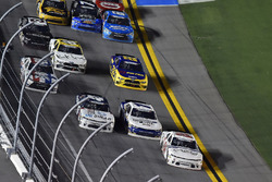 Justin Haley, GMS Racing, Chevrolet Camaro FOE passes Elliott Sadler, JR Motorsports, Chevrolet Camaro Chevrolet ARMOUR Chili and Kyle Larson, Chip Ganassi Racing, Chevrolet Camaro DC Solar under the yellow line