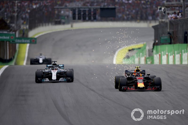 Verstappen is applauded after passing Hamilton for the lead