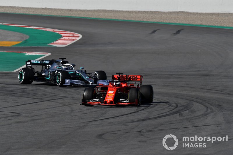 Sebastian Vettel, Ferrari SF90 and Valtteri Bottas, Mercedes-AMG F1 W10 EQ Power+
