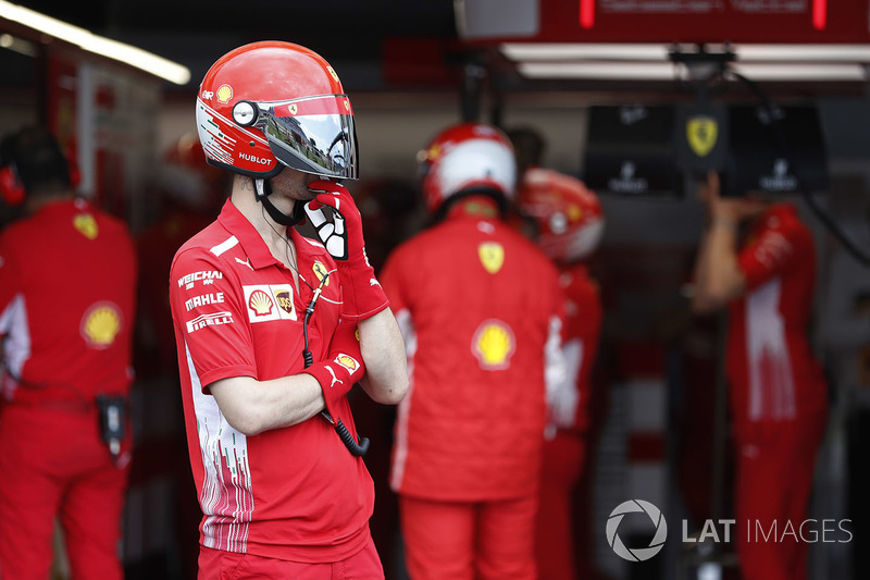 A Ferrari pit crew team member