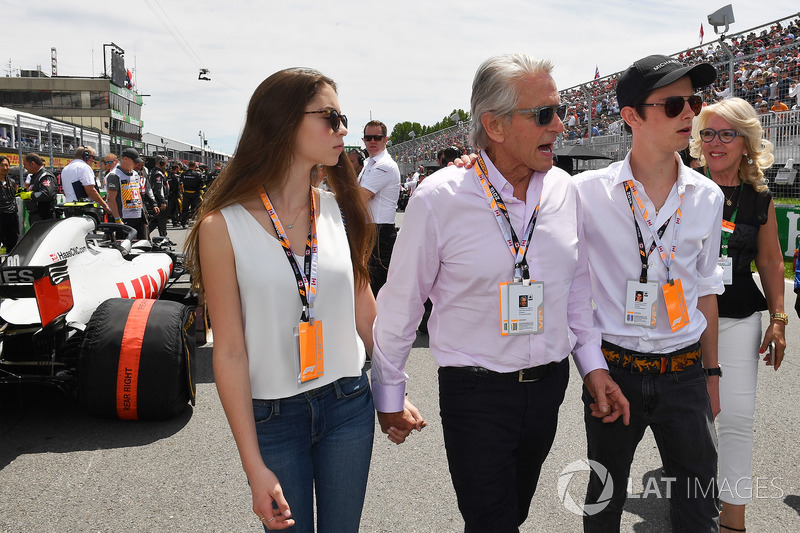 Michael Douglas, with his son Dylan Douglas, and daughter Carys Zeta-Douglas, on the grid