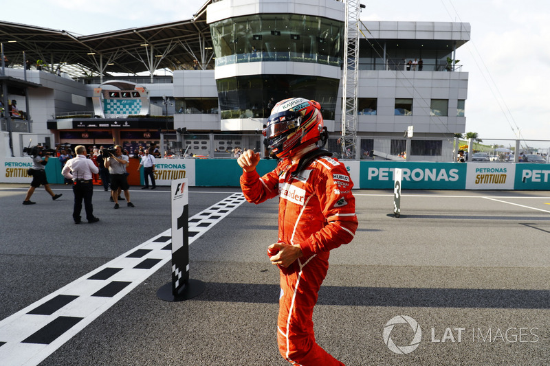 Kimi Raikkonen, Ferrari, celebrates after qualifying second
