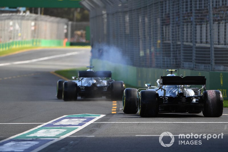 Lewis Hamilton, Mercedes AMG F1 W10, leads Valtteri Bottas, Mercedes AMG W10, onto the circuit