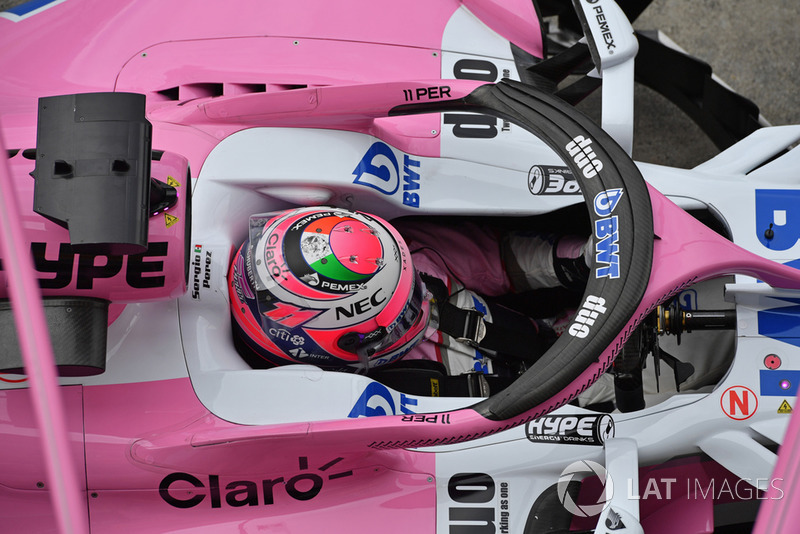 Sergio Perez, Racing Point Force India VJM11 driving into his pit box