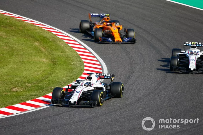 Lance Stroll, Williams FW41, Sergey Sirotkin, Williams FW41, y Stoffel Vandoorne, McLaren MCL33 