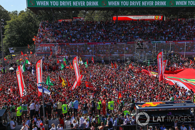 Ferrari Fans and flags at the podium celebrations on the podium