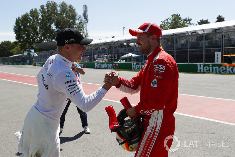 Valtteri Bottas, Mercedes AMG F1, congratulates Sebastian Vettel, Ferrari