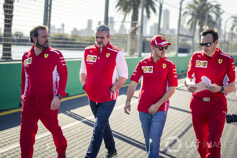 Sebastian Vettel, Ferrari walks the track with Maurizio Arrivabene, Ferrari Team Principal and Riccardo Adami, Ferrari Race Engineer