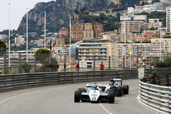 Keke Rosberg leads his son Nico Rosberg as they lap the circuit in their respective Championship winning cars