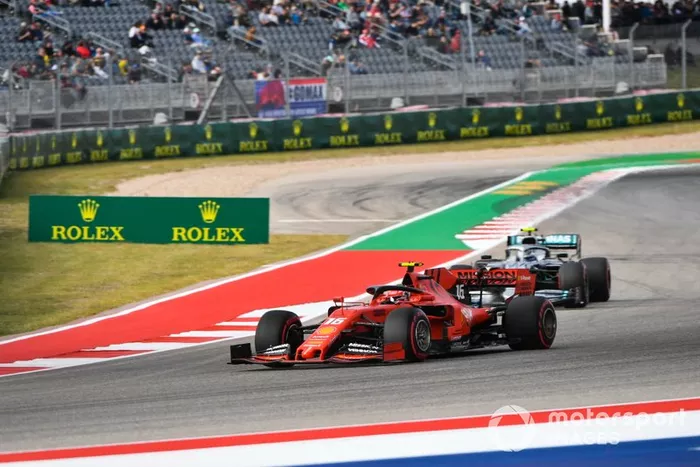 Charles Leclerc, Ferrari SF90, leads Valtteri Bottas, Mercedes AMG W10