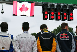 grid observes national anthem