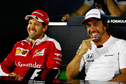 Sebastian Vettel, Ferrari; Fernando Alonso, McLaren